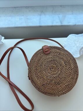 Round Woven Straw Crossbody Bag with Brown Leather Strap